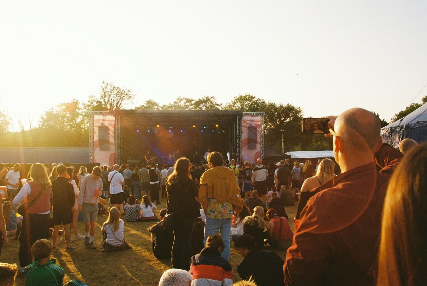 Outdoor community event at golden hour